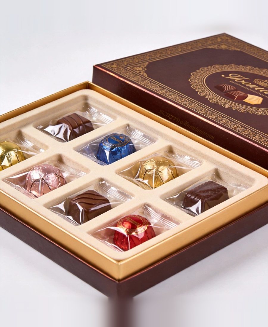 Gold and brown praline box with nine cells