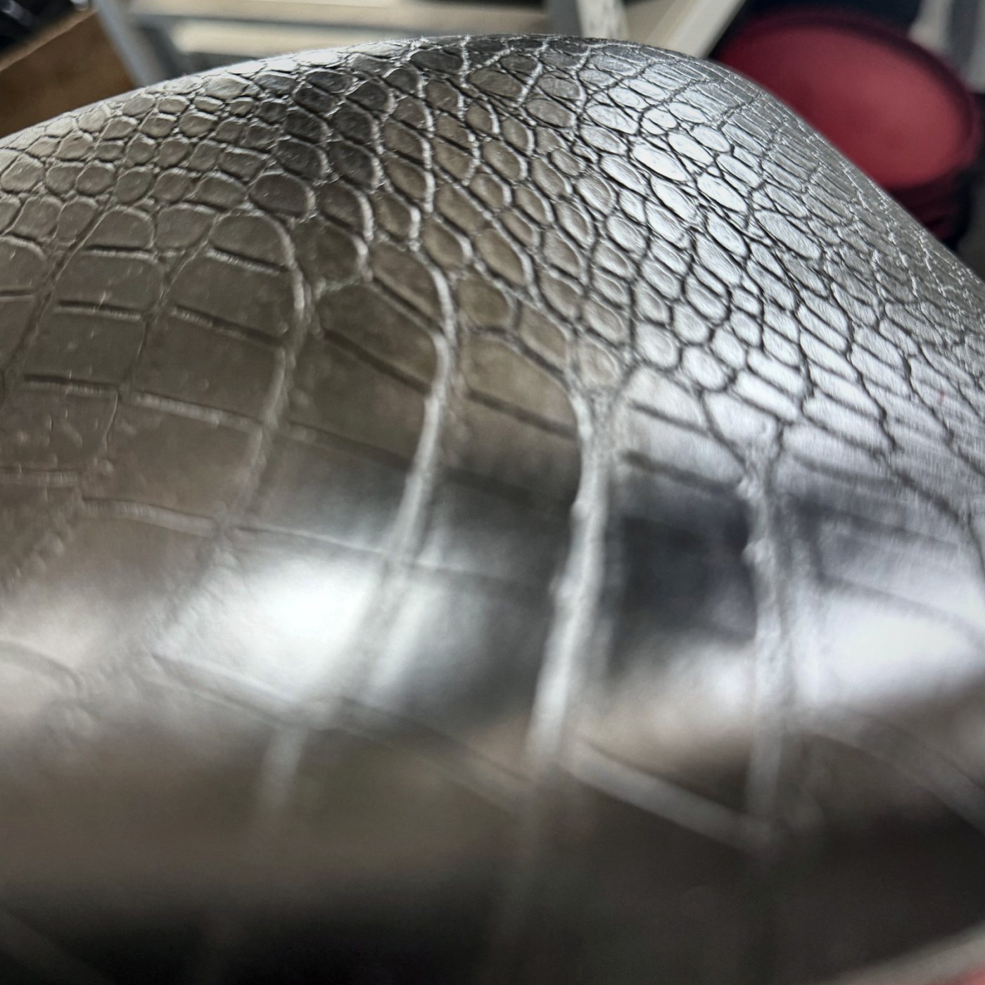 Crocodile-embossed surface